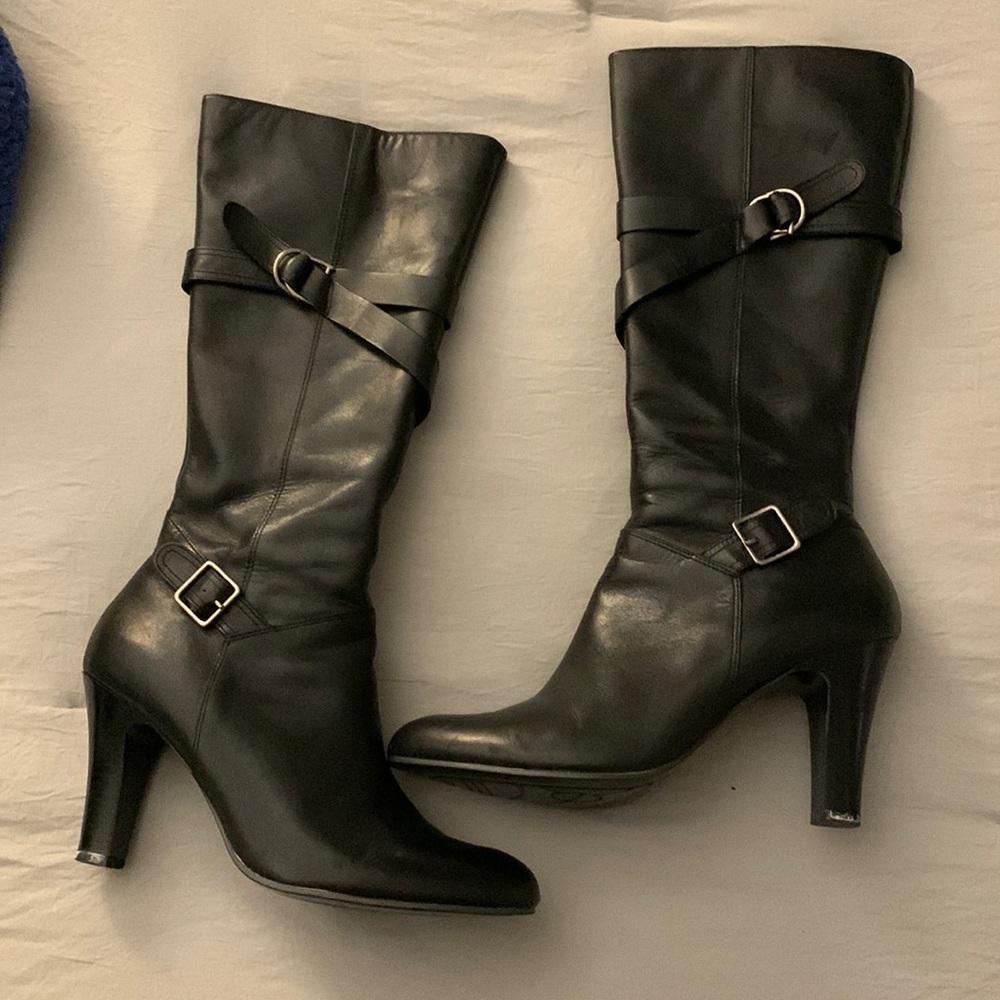 Woman’s black tall boots